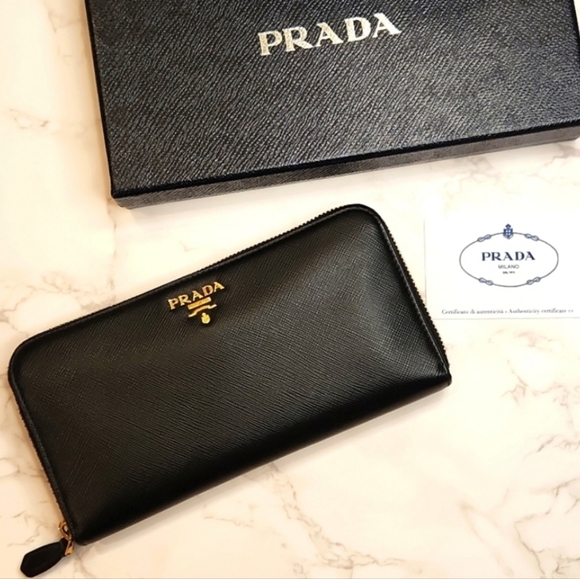 Prada Handbags - Authentic Prada Saffiano Black Zippy Wallet